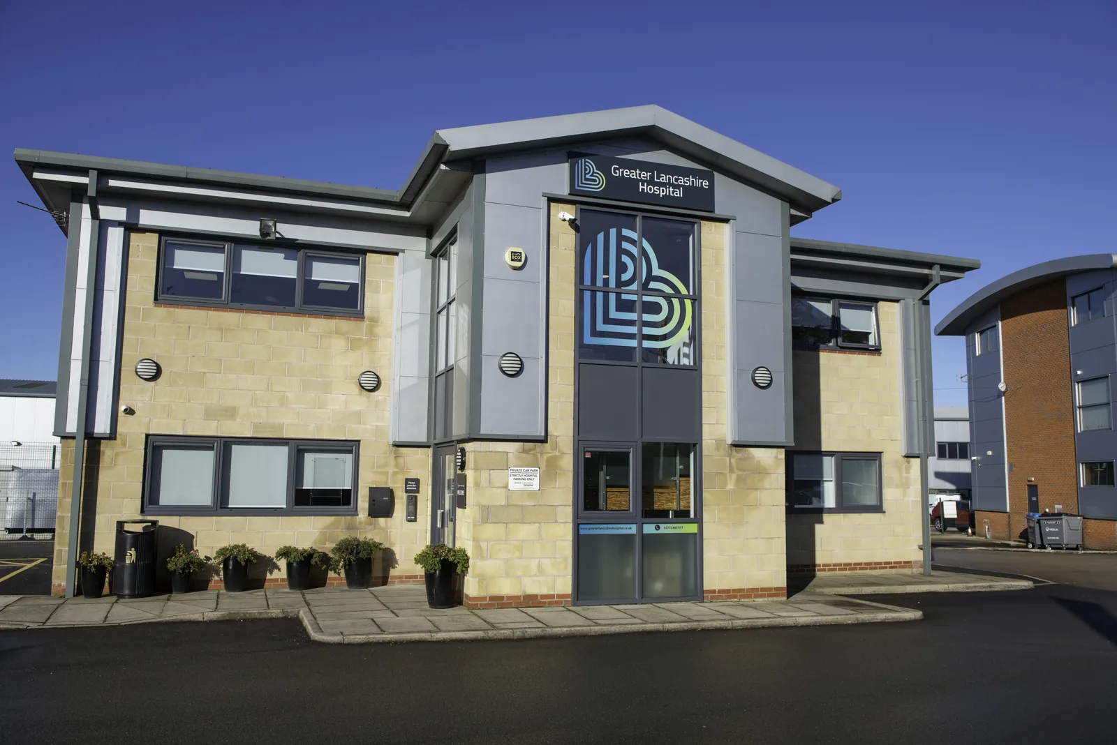 Greater Lancashire Hospital entrance elevation with neighbouring buildings