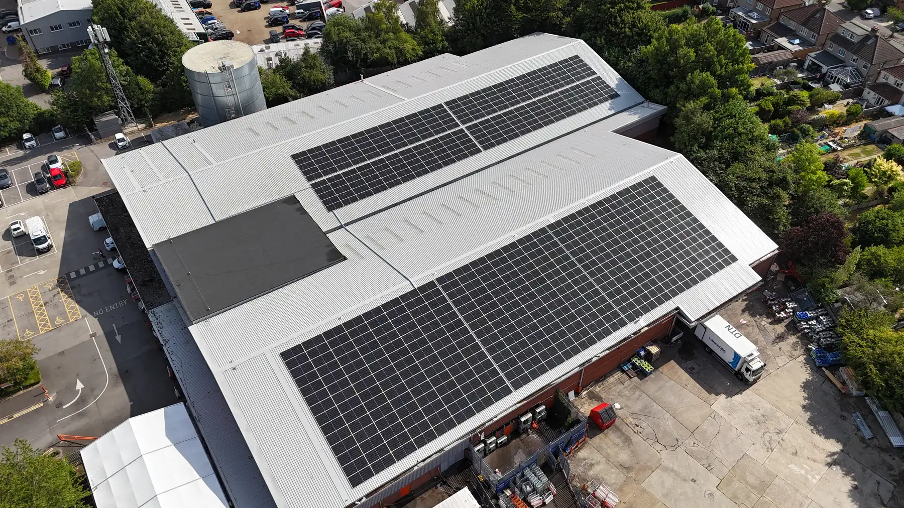 Solar arrays across factory roofs