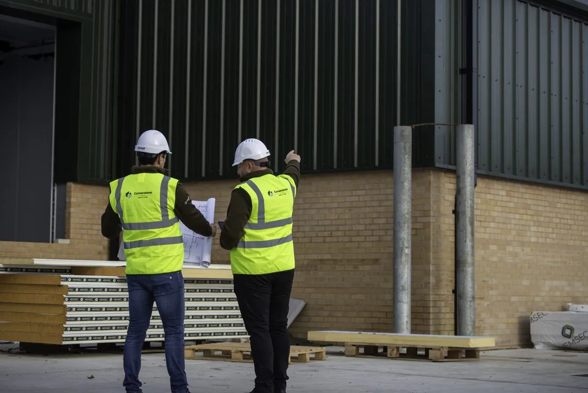 Industrial site with the Cornerstone Group team