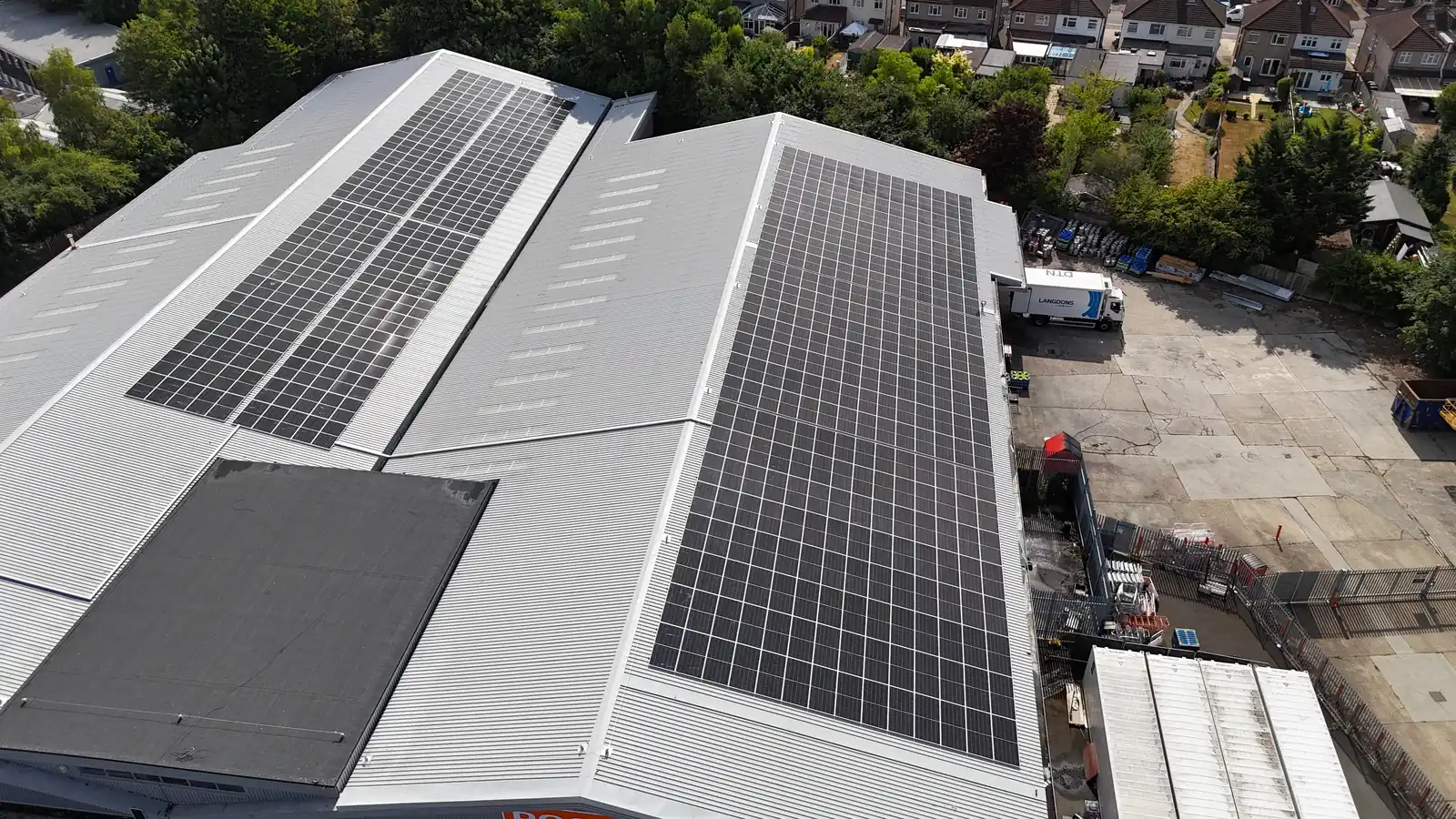 Close aerial of the solar array across the Booker Watford roof sheets