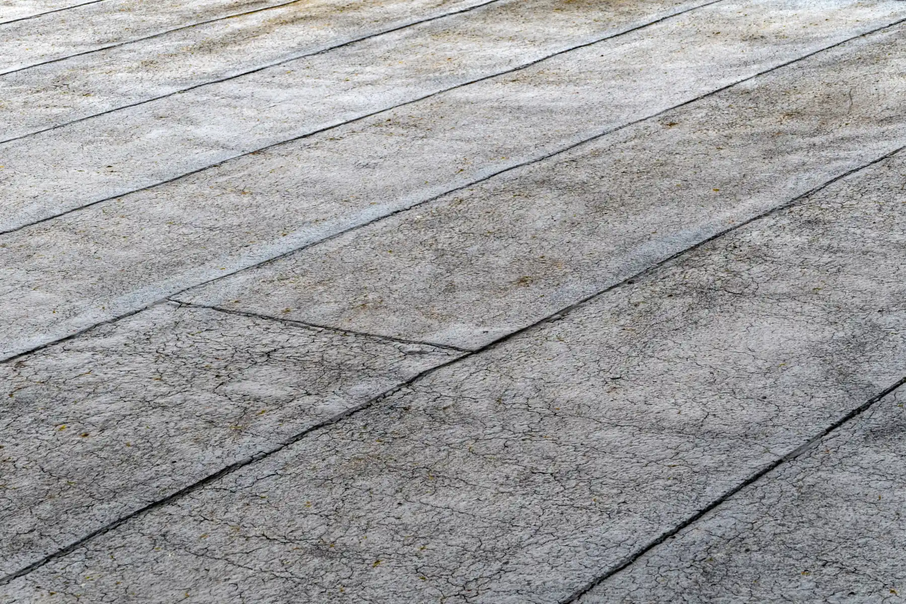 An aged, weathered roof surface